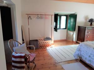 Postel nebo postele na pokoji v ubytování A casa de Froxan + 3 fotografie
