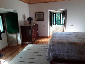 Postel nebo postele na pokoji v ubytování A casa de Froxan