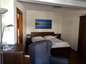 Postel nebo postele na pokoji v ubytování Hotel Rupertihaus