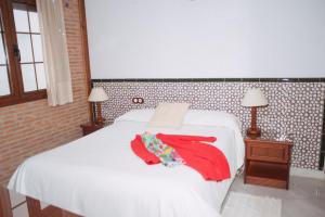 Posteľ alebo postele v izbe v ubytovaní Vivienda Turistica Arabeluj