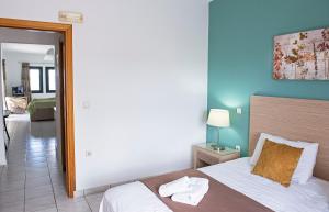 Postel nebo postele na pokoji v ubytování Sunrise Beachfront Apartment