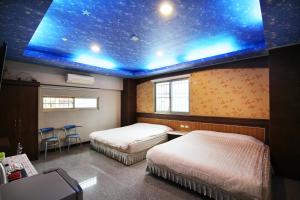 集集苹果的家民宿客房内的一张或多张床位