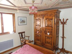 Postel nebo postele na pokoji v ubytování Gîte "Au Vigneron"