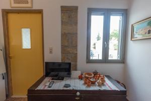 A television and/or entertainment centre at Iliopetra House