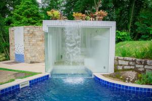 A piscina localizada em Pousada Maritacas do Sana ou nos arredores
