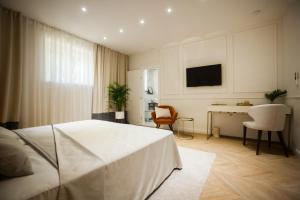 Televisi dan/atau pusat hiburan di Club boutique rooms