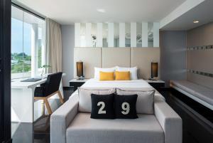 Säng eller sängar i ett rum på Tsix5 Hotel