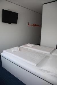 Postel nebo postele na pokoji v ubytování HB1 Budget Hotel - contactless check in