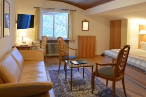 TV a/nebo společenská místnost v ubytování Stoll's Hotel Alpina