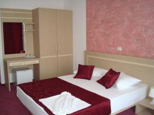 Кровать или кровати в номере Hotel Vis