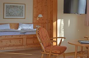 Postel nebo postele na pokoji v ubytování Stoll's Hotel Alpina