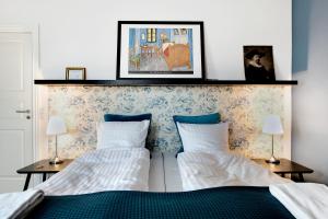 Postel nebo postele na pokoji v ubytování Årslev B&B