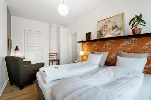Postel nebo postele na pokoji v ubytování Årslev B&B