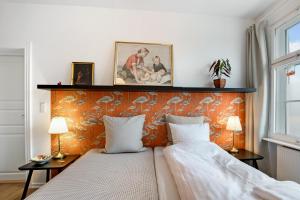 Postel nebo postele na pokoji v ubytování Årslev B&B