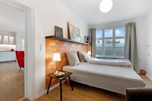 Postel nebo postele na pokoji v ubytování Årslev B&B