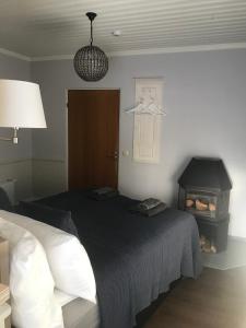 Postel nebo postele na pokoji v ubytování Villa Kertelhof Guesthouse