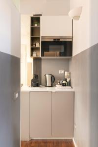 Kuhinja oz. manjša kuhinja v nastanitvi Living RHome - Condotti Apartment