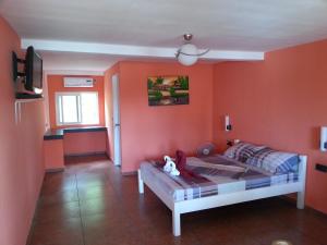 Postel nebo postele na pokoji v ubytování Binucot Beach Resort