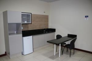 
A kitchen or kitchenette at Blu Apart Hotel

