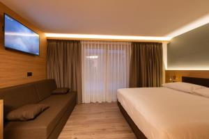 Postel nebo postele na pokoji v ubytování Hotel Centro's