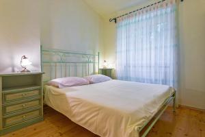 Posteľ alebo postele v izbe v ubytovaní Villa Arbora in Kavran (Haus für 10 Personen) + 37 fotografií