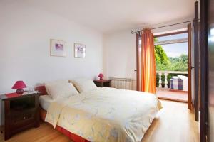 Postel nebo postele na pokoji v ubytování Villa Aurata in Ližnjan (Haus für 8-9 Personen) + 26 fotografií