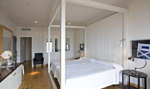 Postel nebo postele na pokoji v ubytování Hotel Trias