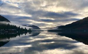 a view of a lake with mountains in the background at The Shore House in Lochgoilhead