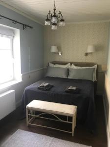 Postel nebo postele na pokoji v ubytování Villa Kertelhof Guesthouse