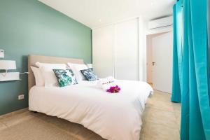 Voodi või voodid majutusasutuse Villas Rock & Beach toas