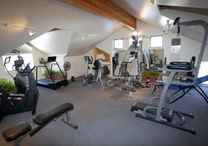 a gym with several exercise equipment in a room at Rams Horn Village Resort in Estes Park