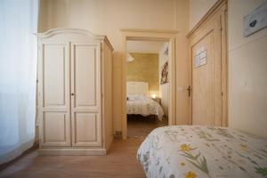 Postel nebo postele na pokoji v ubytování Albergo Etruria