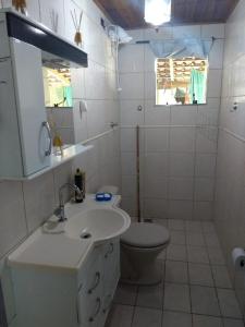 Ett badrum på Chácara do Delei