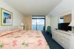 Giường trong phòng chung tại Ocean Towers Resort