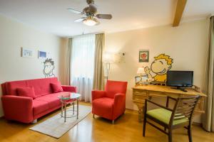 TV a/nebo společenská místnost v ubytování Hotel Brunner