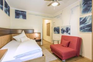 Postel nebo postele na pokoji v ubytování Hotel Brunner