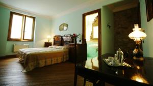 Uma cama ou camas num quarto em B&B Sciabakè