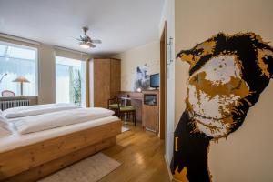 Postel nebo postele na pokoji v ubytování Hotel Brunner