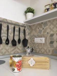 A kitchen or kitchenette at PEPPE'S HOME Luxury and relax apartament