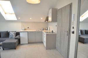 Kuchyňa alebo kuchynka v ubytovaní Willa Dobryłko II -Apartamenty