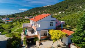 an aerial view of a house with an orange roof at Apartment Milja in Banjol