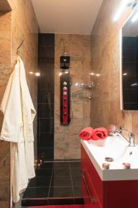 Ванная комната в Romantický wellness suite hotel Heinz