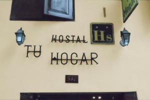 Majutusasutuses Hostal Tu Hogar olev sertifikaat, autasu, silt või muu dokument