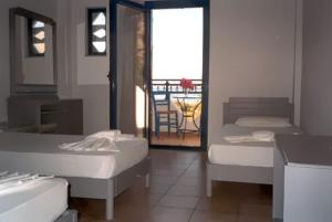Posteľ alebo postele v izbe v ubytovaní Oasis Apartments