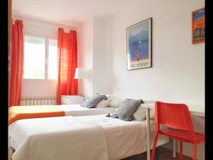 En eller flere senge i et værelse på Luminoso Piso en Navacerrada Wifi