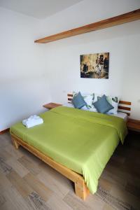 Кровать или кровати в номере Tamarind