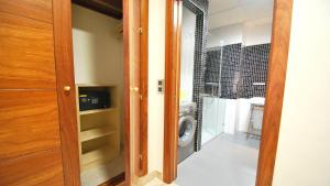 a laundry room with a washing machine in a room at Apartamentos Living Sevilla Centro Maestranza in Seville +70 photos