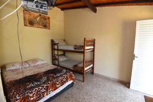 Postel nebo postele na pokoji v ubytování Pousada Serrana