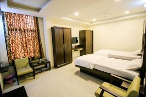 Cama ou camas em um quarto em Namastay welcome home - Abu Road