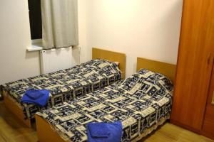 Кровать или кровати в номере Гостевой дом Апарт-Руза